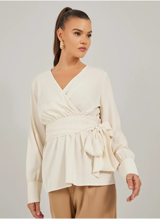 Styli Solid Balloon Sleeve Wrap Top with Tie Detail