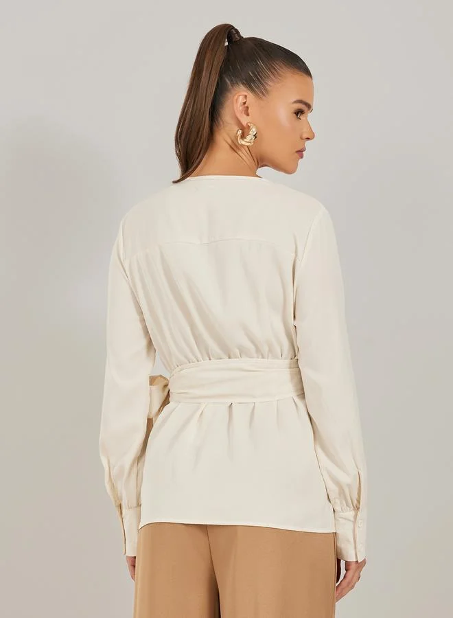 Styli Solid Balloon Sleeve Wrap Top with Tie Detail
