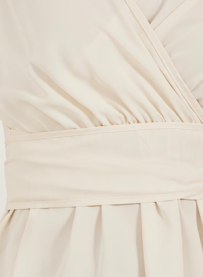 ستايلي بلوزة ملفوفة بأكمام بالون سادة مع تفاصيل ربط - Image 3