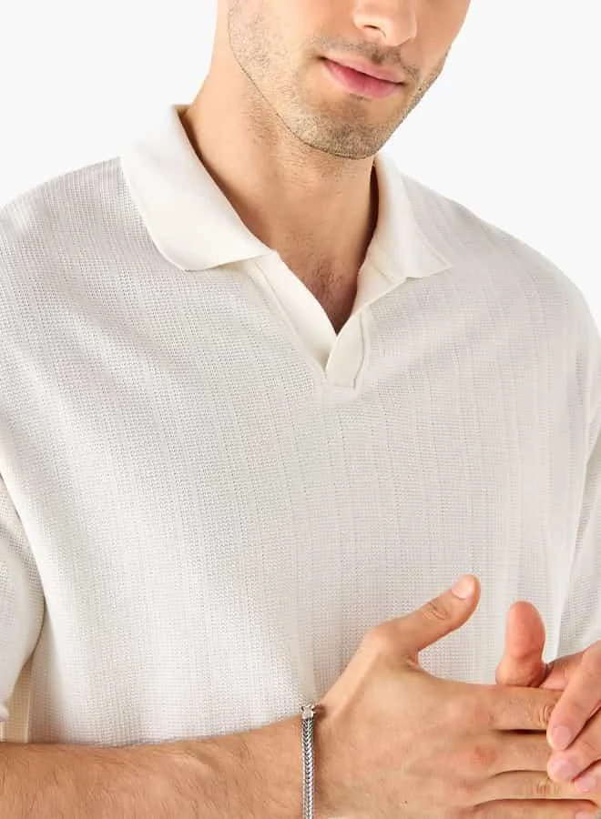 ايكونيك تيشيرت بولو بارز الملمس بأكمام قصيرة من آيكونيك