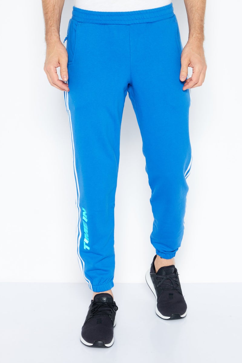 adidas Originals Men Sportswear Fit Brand Logo Training Sweatpants, Blue - Image 1