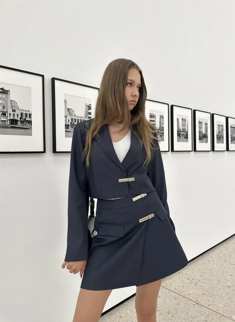 Lichi Mini wrap skirt with turn lock clasp