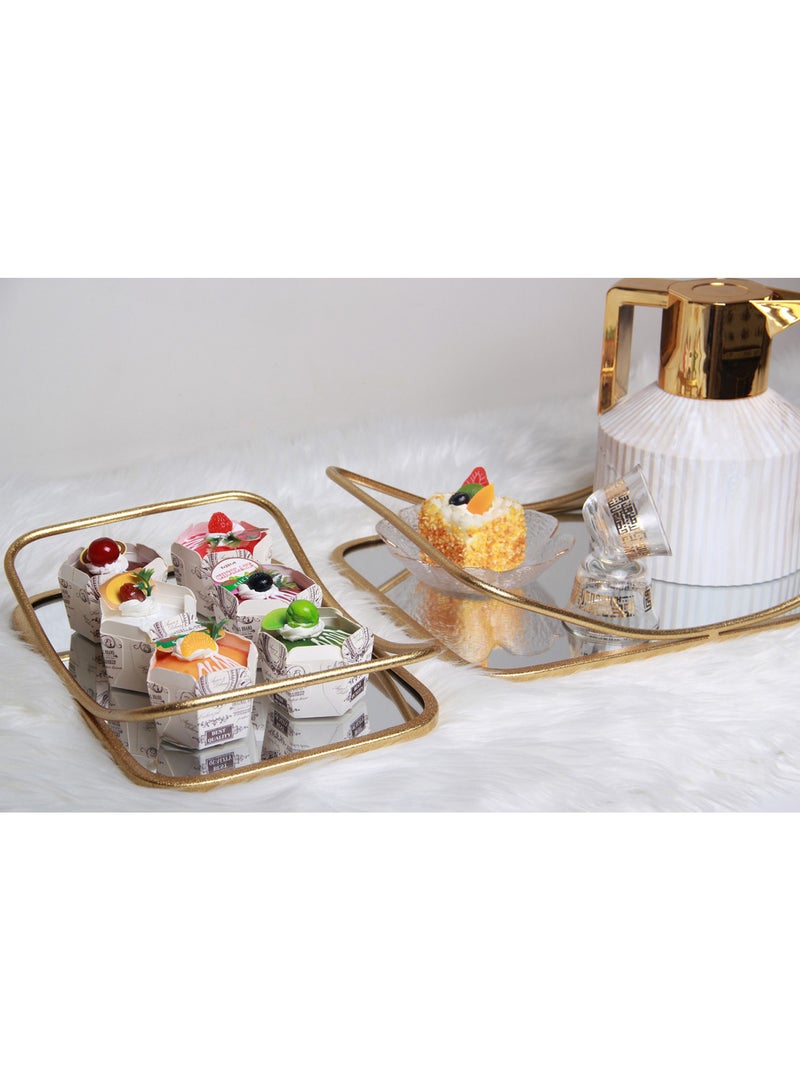 A set of two-piece golden serving trays . - Image 1