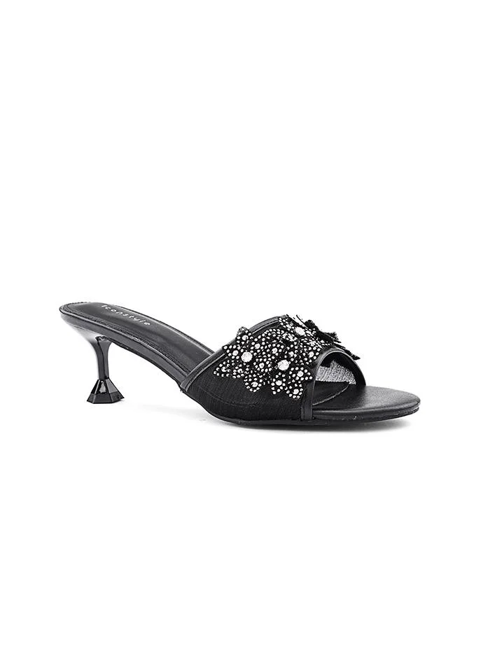 أيقون Sparkling heel slipper with a cushioned comfort base.