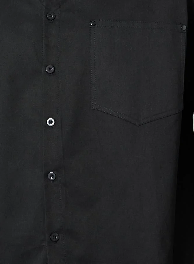 ستايلي قميص قطني بقصة واسعة