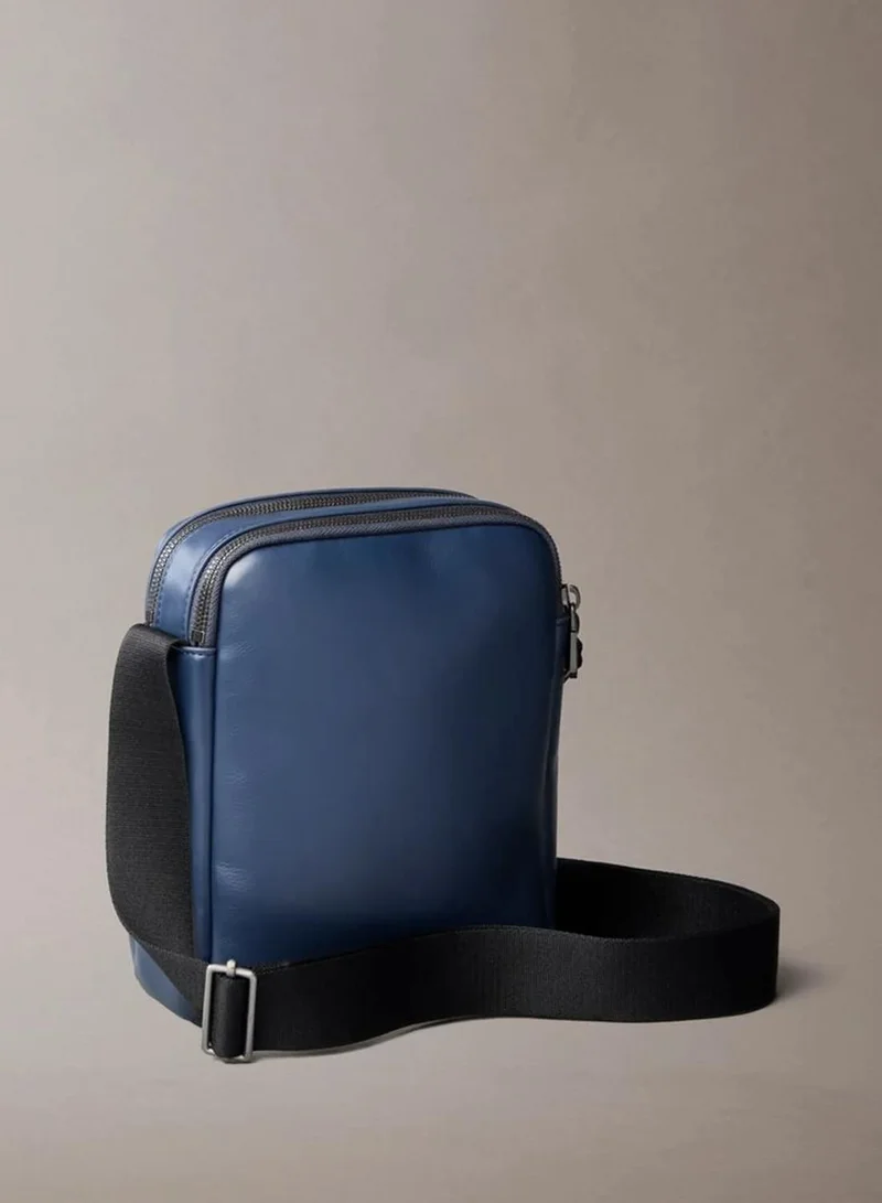 Calvin Klein Blue Nights Embossed Monogram Reporter Bag for Men | Best Price UAE