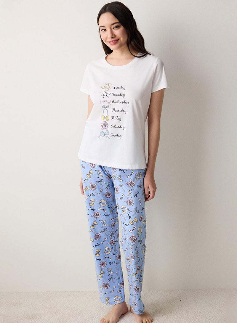 بنتي طقم بيجاما قطن بفيونكة لطيفة - Image 1