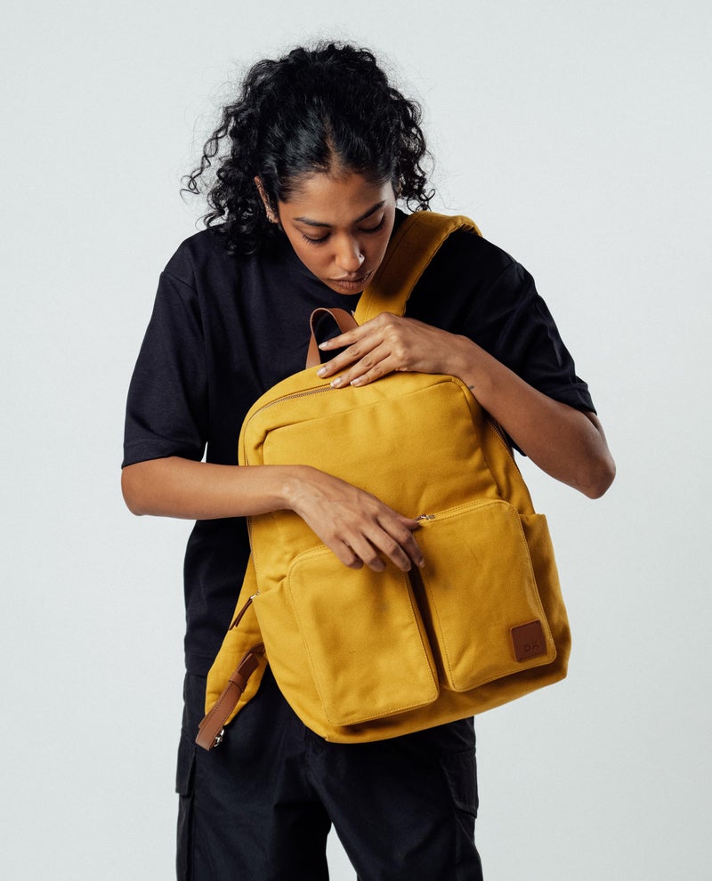 DailyObjects Mustard Field Backpack (20L) | Casual Laptop Bag with Luggage Sleeve | Unisex Travel Backpack | Durable Canvas Material | Zippered Compartments with Pockets - Image 2