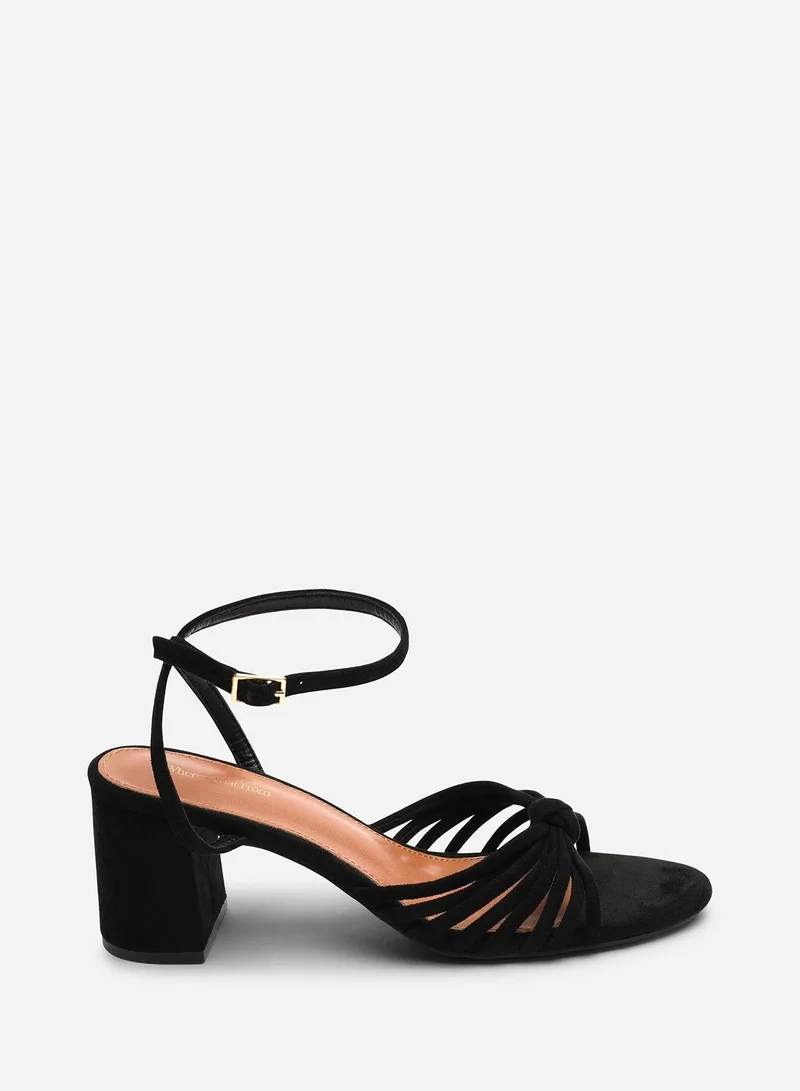 Where's That From Blossy Knotted Block Heel Sandal With Ankle Strap in Black Suede