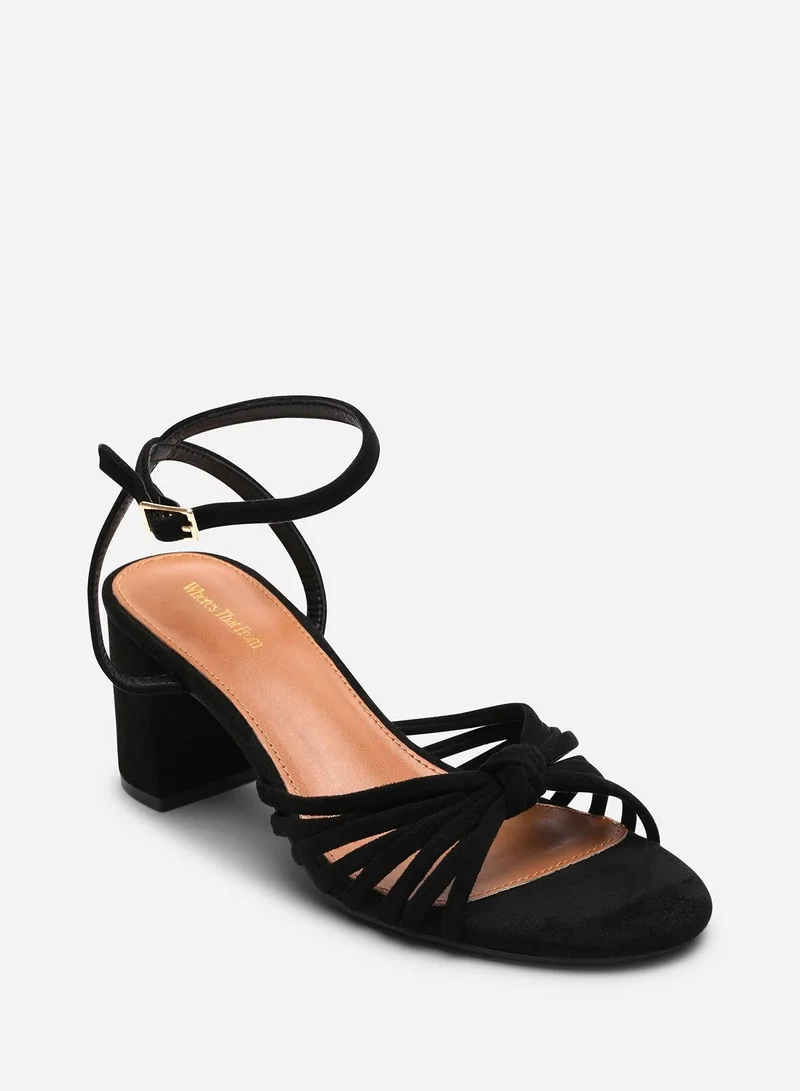 Where's That From Blossy Knotted Block Heel Sandal With Ankle Strap in Black Suede