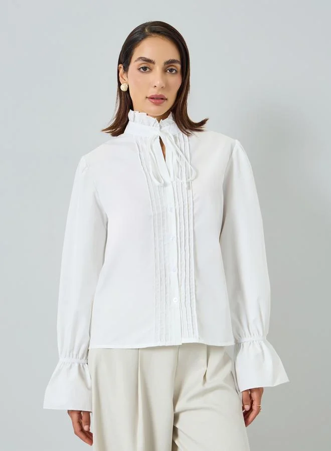 تايك تو بلوزةة بيضاء بأكمام طويلة وياقة مكشكشة