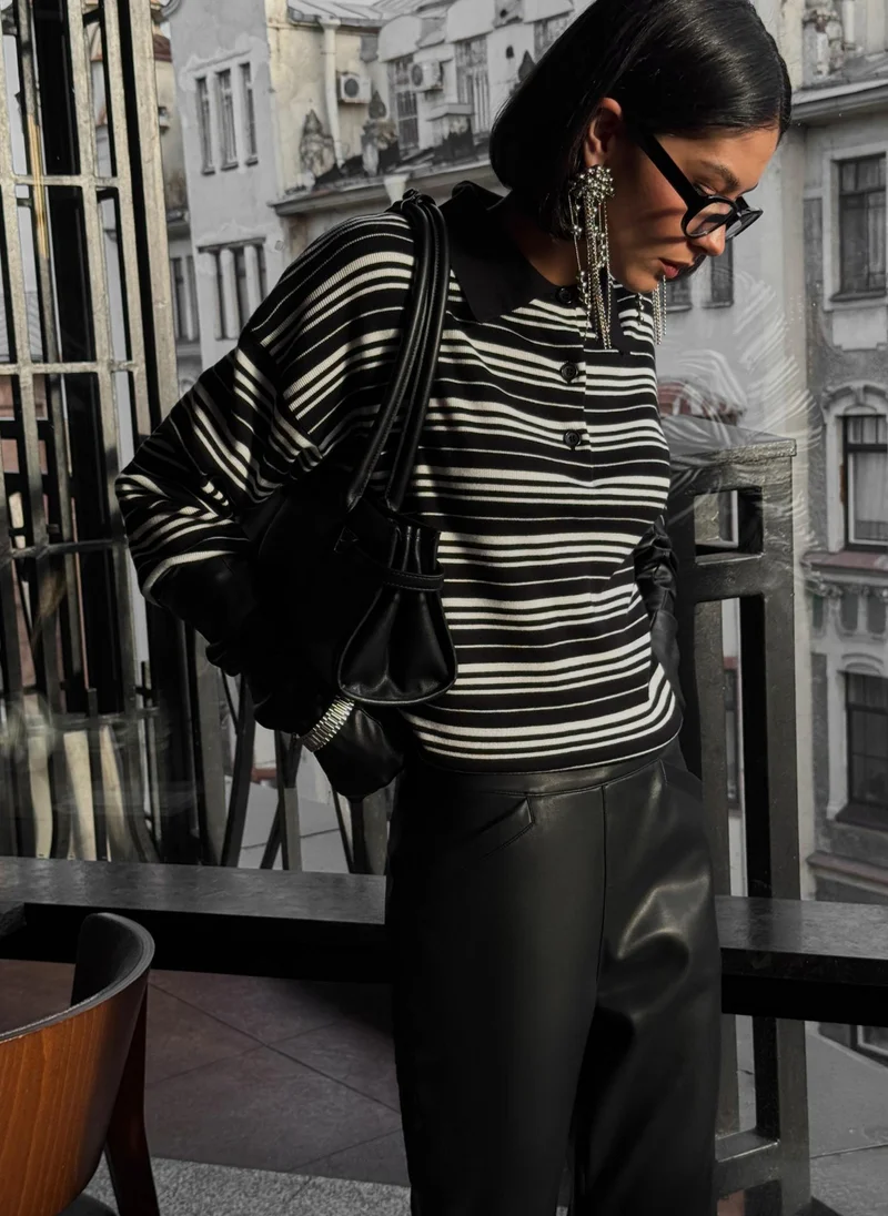 Lichi Flared eco-leather trousers