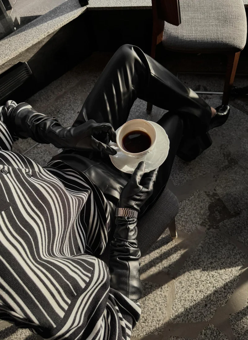 Lichi Flared eco-leather trousers