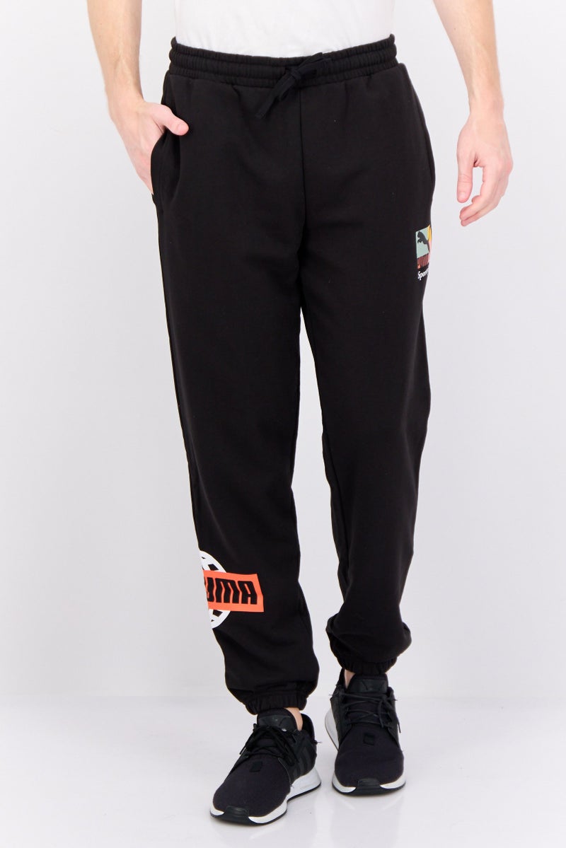 PUMA سروال رياضي للرجال مناسب في الهواء الطلق، أسود - Image 1