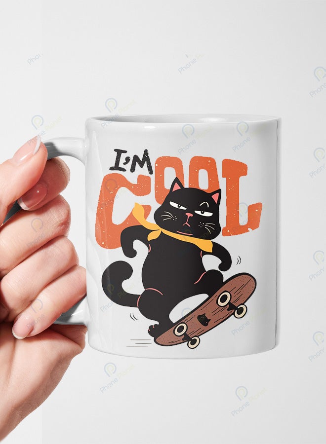 كوب من السيراميك مطبوع عليه عبارة أنا كوول ويتميز بمقبض مريح