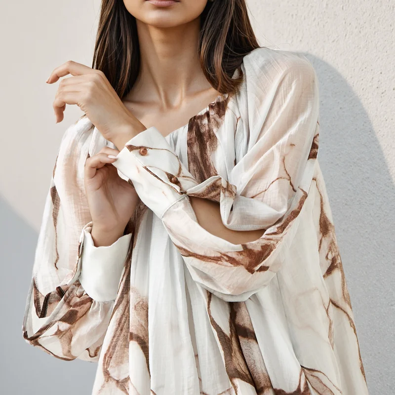 ايكونيك فستان ميدي أيقوني بطبعة رخامية مع جيوب