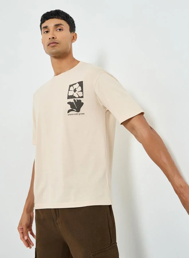 Styli Men Beige Graphic Print Oversized T-Shirt