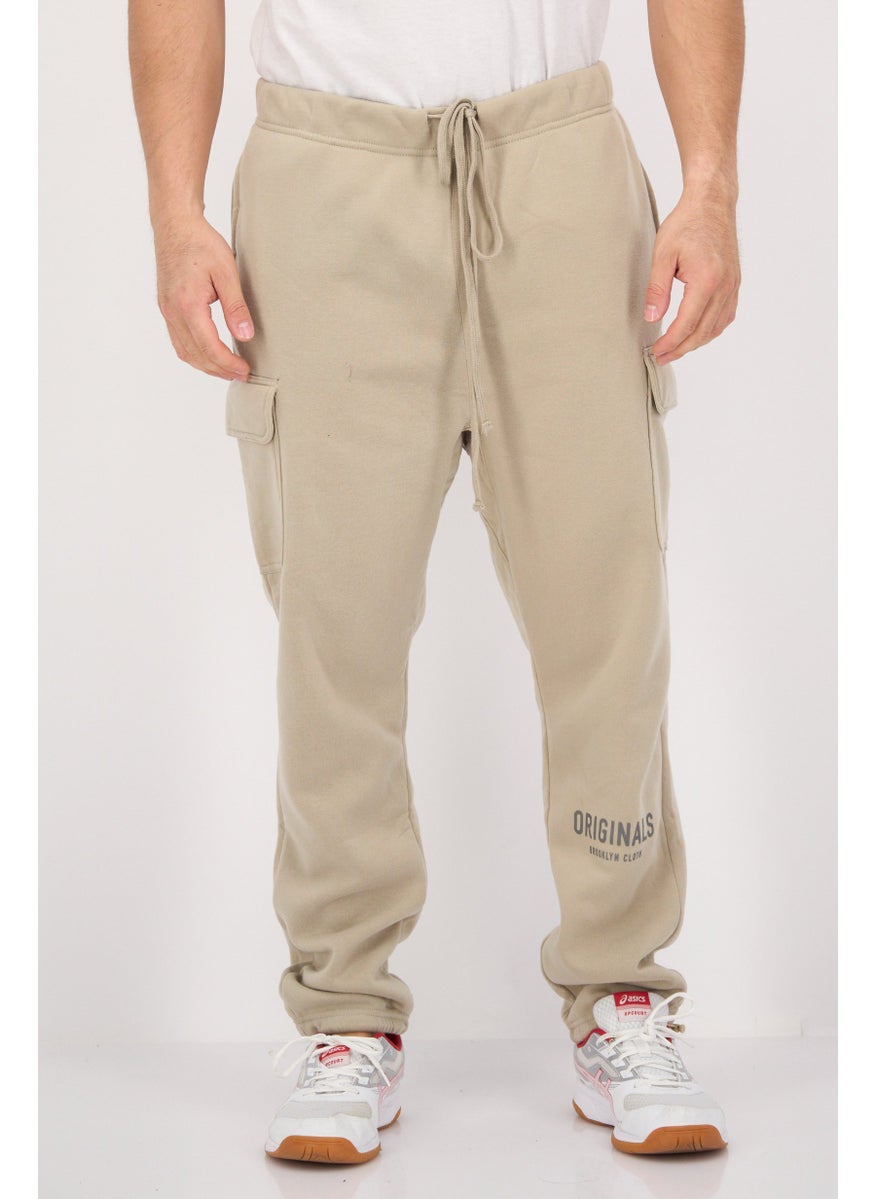 Men Regular Fit Brand Logo Sweatpants, Taupe - pzsku/ZA32256D25BD81F731945Z/45/_/1737641902/30faca33-6d0c-45f7-94c6-74012df07ae8