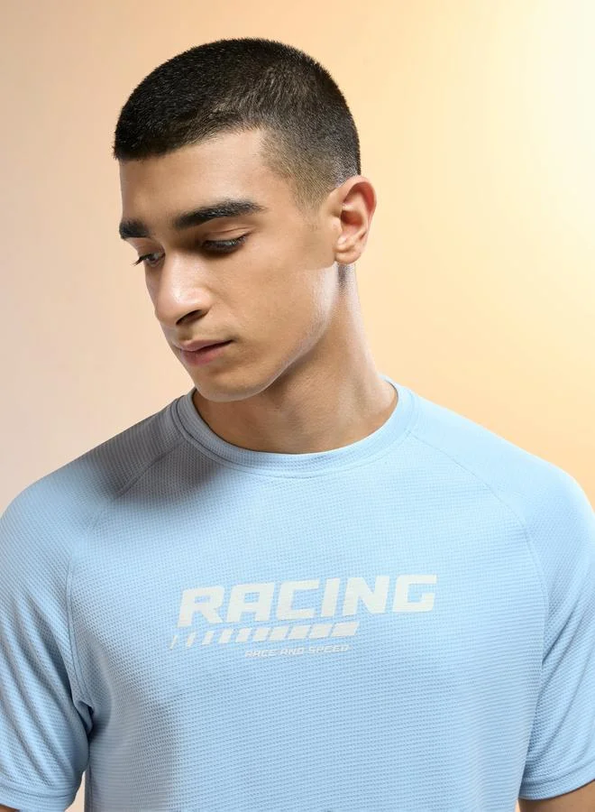 تكنوسبورت تيشيرت رياضي بطبعة كلمات قصة ضيقة