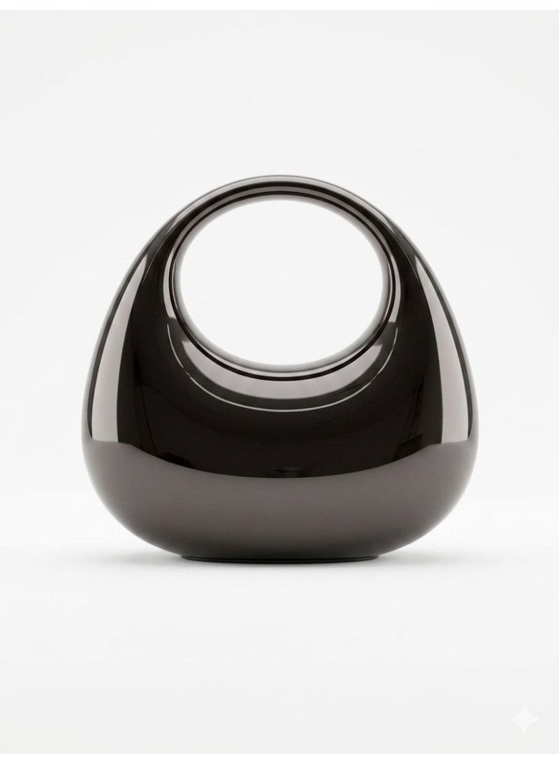A unique moon-shaped acrylic women's handbag with a top handle, perfect for weddings, cocktail parties, and evening events. - Image 1