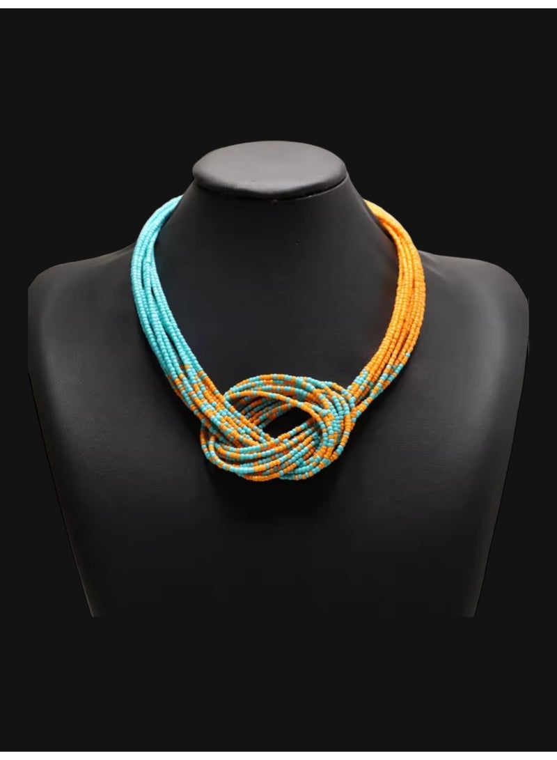 ANUM BY MUNA Handmade Beaded Necklace with Double Knot Design – Orange & Turquoise - Image 1