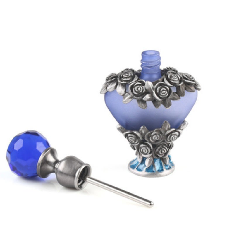 زجاجة عطر مطلية بتصميم عتيق من دبي - مصنوعة من الزجاج بتفاصيل دقيقة على شكل طاووس وفراشة - سدادة فلين معدنية لمجموعة مستحضرات التجميل وروتين الجمال - Image 1