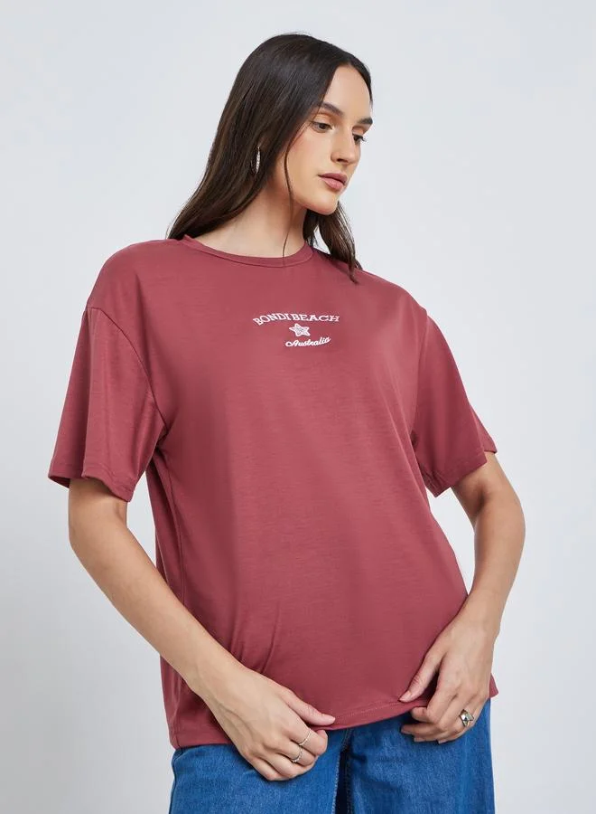 Styli Women Red Bondi Beach Embroidered Oversized T-Shirt