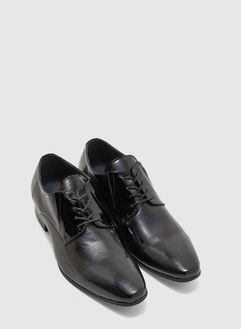 STEVE MADDEN Jaylenn Patent Lace Ups