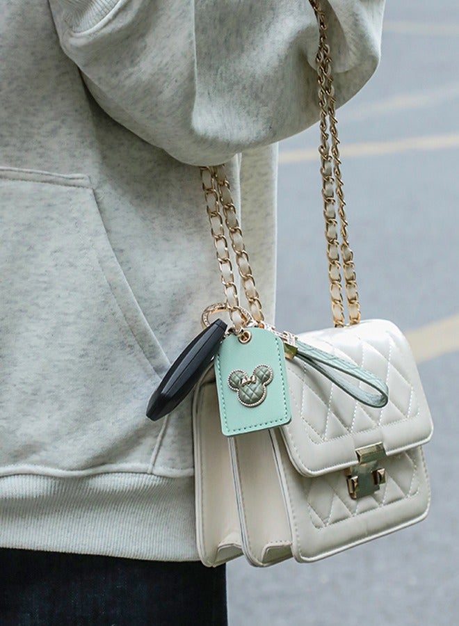 KeyAmor Elegant metal and quilted leather keychain car key holder for adults. Includes a matching AirTag holder.Stylish keychain with golden crystal-accented rings, perfect for women, featuring 3 key rings for added functionality.  Made with elegant mint green leather, offers 360-degree rotation, and comes in a fancy gift box, making it a perfect gift choice. - Image 3