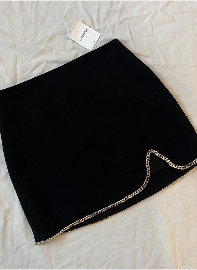 Generic Women black short lycra skirt lined with gold chain  - Image 2