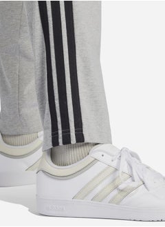 Essentials 3-Stripes Open Hem Fleece Pants - pzsku/ZA38E0B9314A67998386FZ/45/_/1739731939/c55881ed-750f-40fb-aebb-7d63ff0609e3