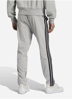 Essentials 3-Stripes Open Hem Fleece Pants - pzsku/ZA38E0B9314A67998386FZ/45/_/1739732060/0bae6e46-2a7e-49b3-9bad-341bd0e2435f