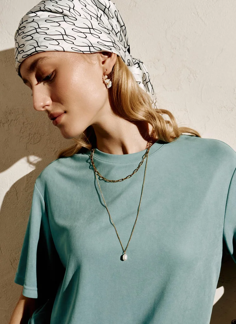 Double chain with pearl pendant
