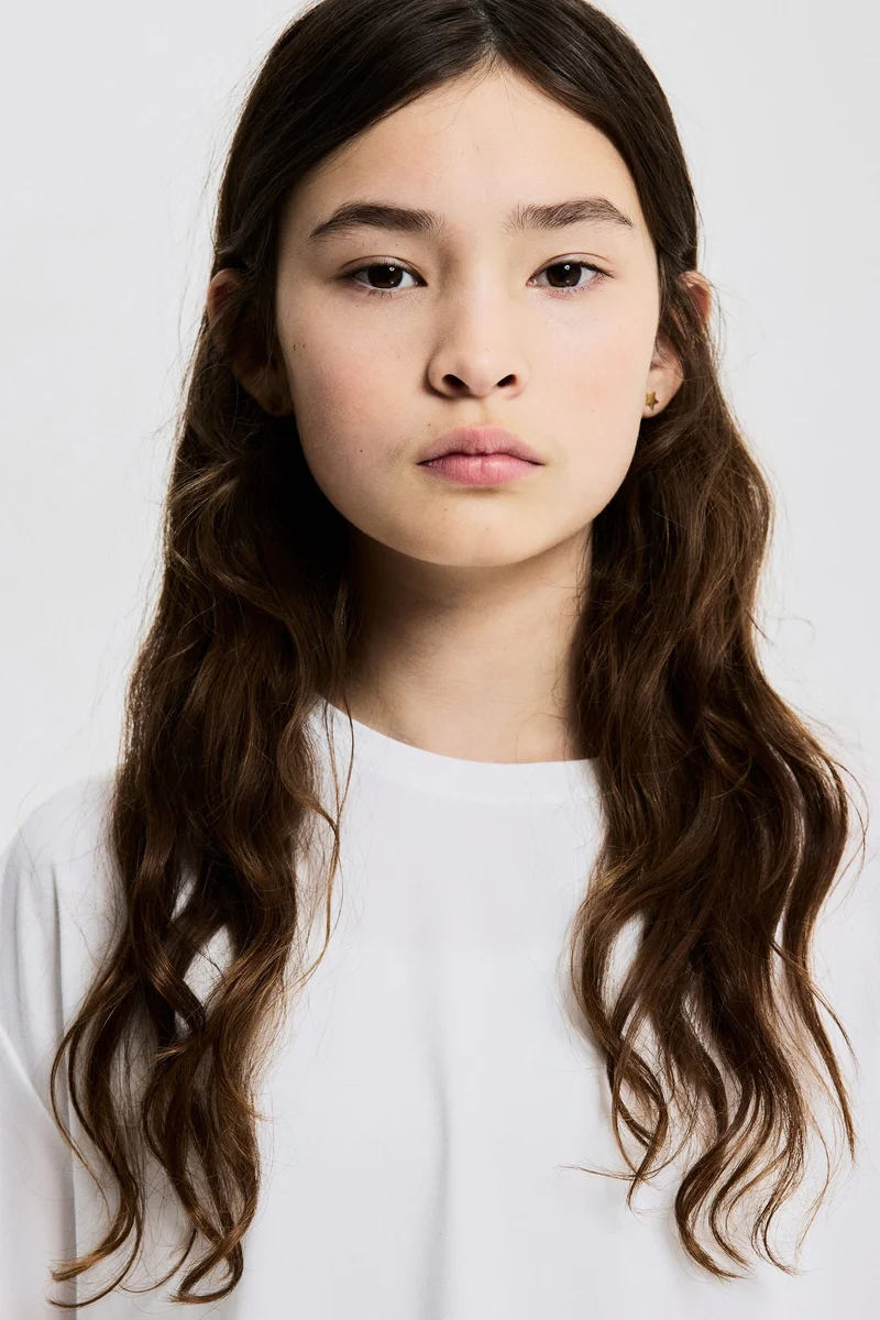 H&M Boxy-style sports top with DryMove™