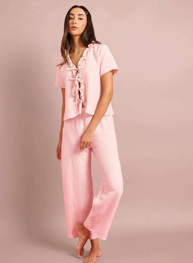 ستايلي Pink Tie-Up Detail Ruffled Top and Pants Pyjama Set