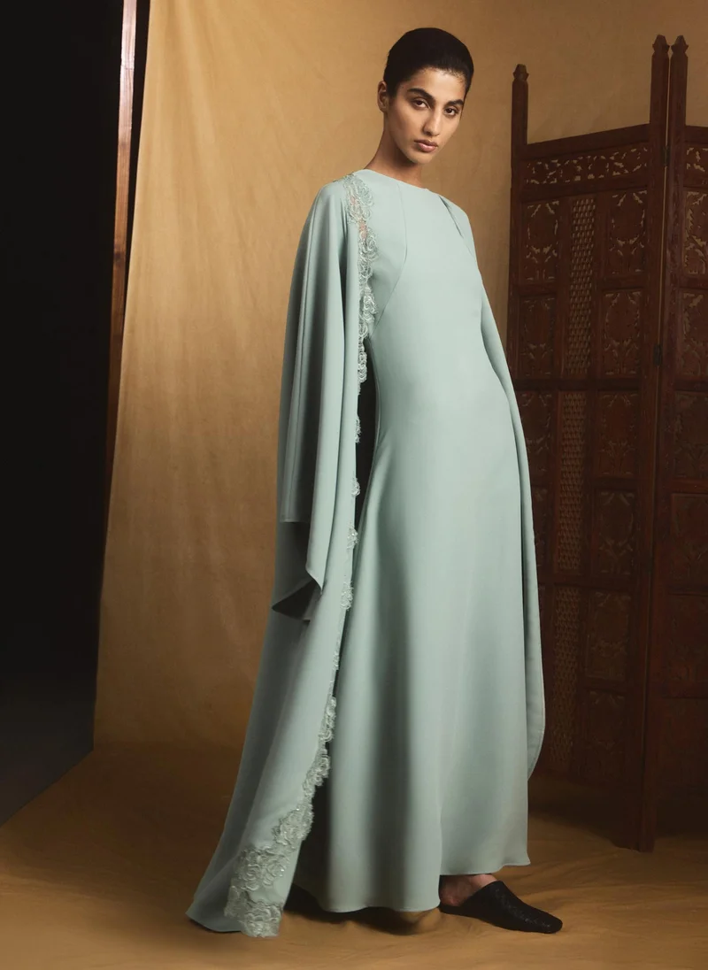 Lichi  Maxi dress with voluminous cape and lace decoration for Women | Best Price UAE