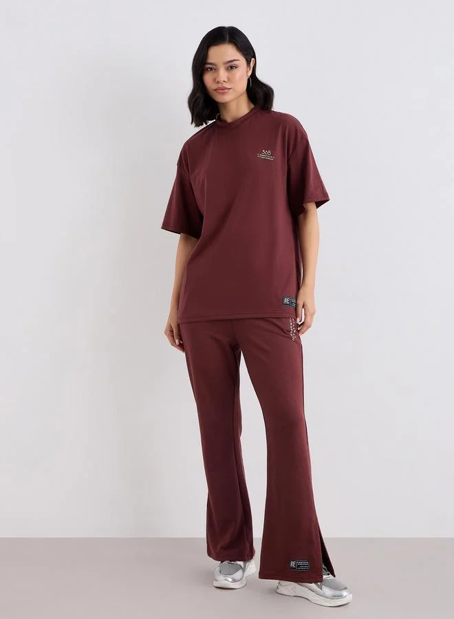 Styli Styli Women Oversized T-Shirt and Flared Leggings Co-Ords