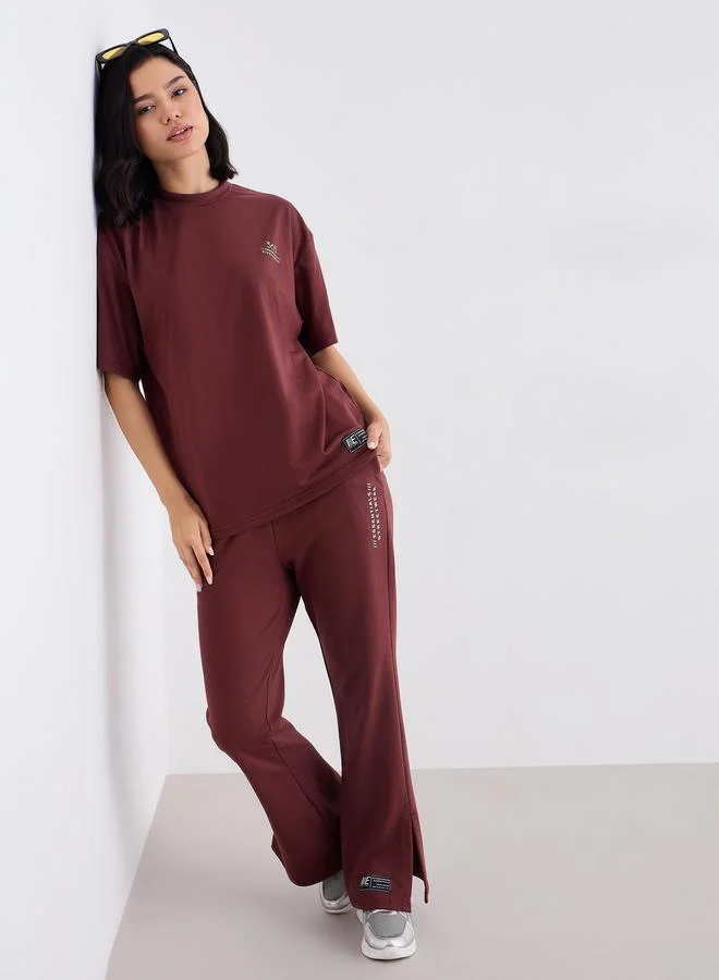 Styli Styli Women Oversized T-Shirt and Flared Leggings Co-Ords