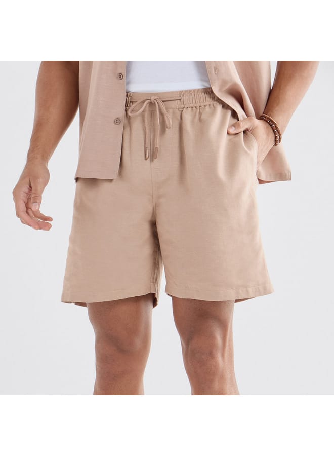 سبلاش فيڤ شورت سادة بخصر مرن ورباط وجيوب - Image 1