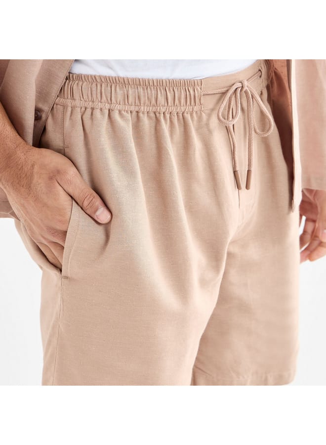 سبلاش فيڤ شورت سادة بخصر مرن ورباط وجيوب - Image 4