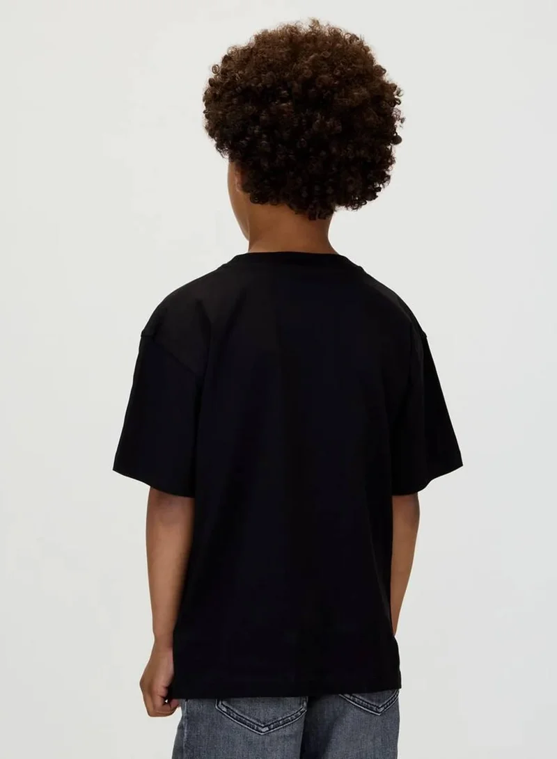 Calvin Klein Jeans Ck Black Filled-In Photo Monogram T-Shirt for Men | Best Price UAE