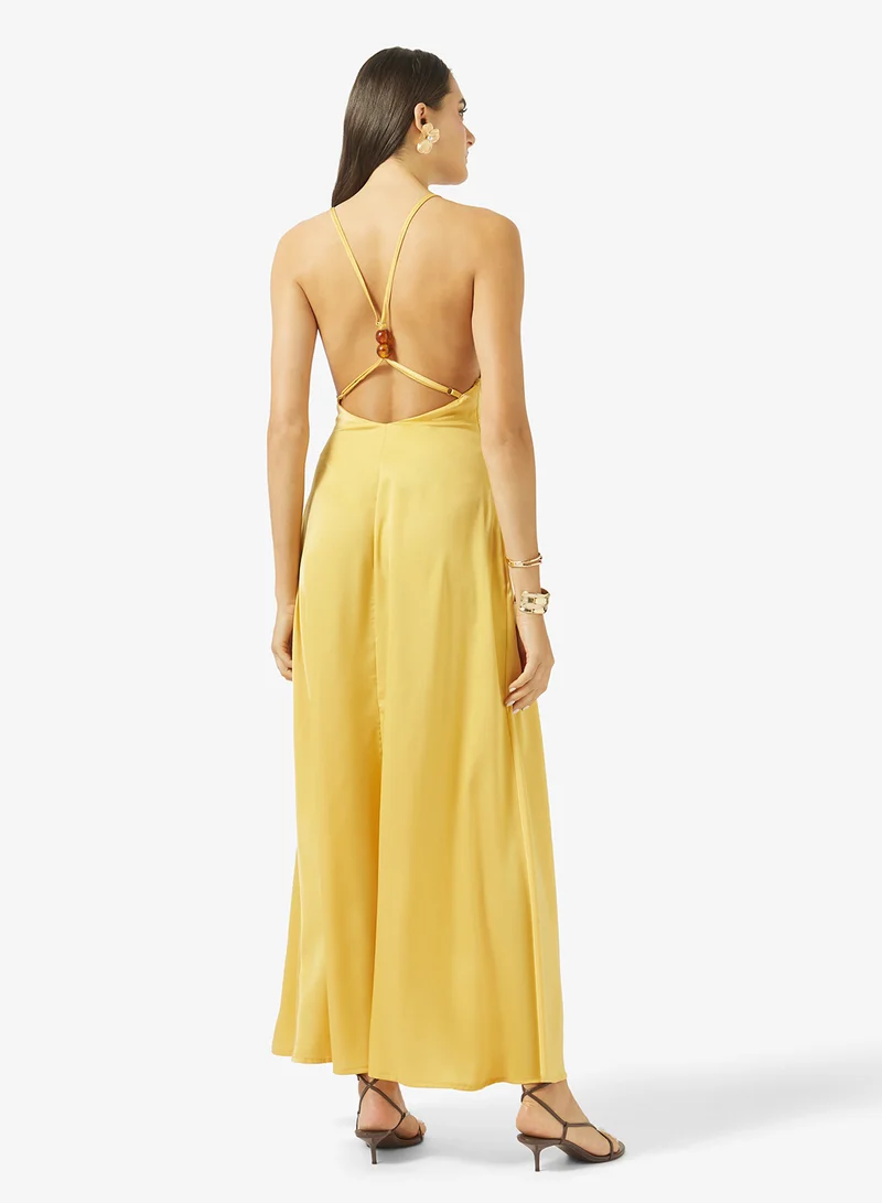 جينجر فستان ماكسي بفتحة صدر عميقة