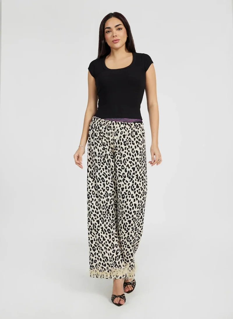 Reem Abayas Animal Print Feather Pants