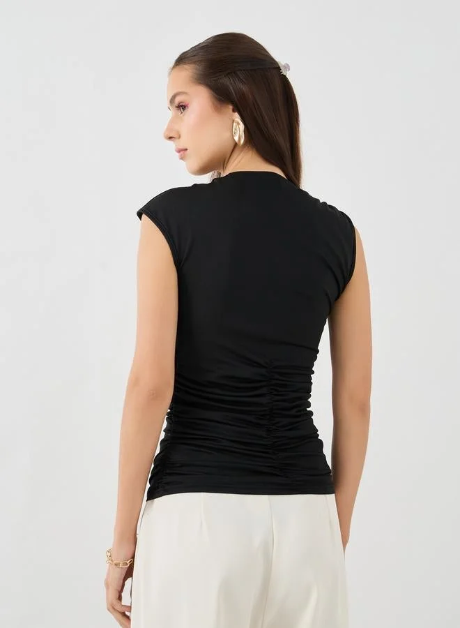 تايك تو توب بدون أكمام بياقة غير متماثلة من تايك تو