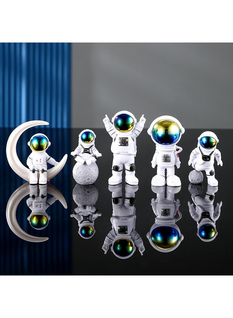 Bluejw مجموعة تماثيل رائد الفضاء المكونة من 5 قطع - تمثال رائد الفضاء للزينة على المكتب والطاولة - زينة كوكب رائد الفضاء من الراتنج لغرفة نوم ذات طابع الفضاء - زينة كعكة - مجموعة نموذجية - Image 1