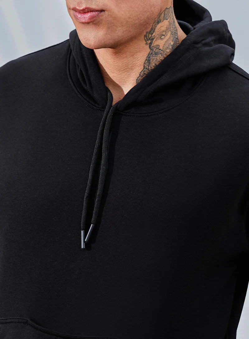 Campus Sutra Men's Onyx Black Solid Pullover Hoodie