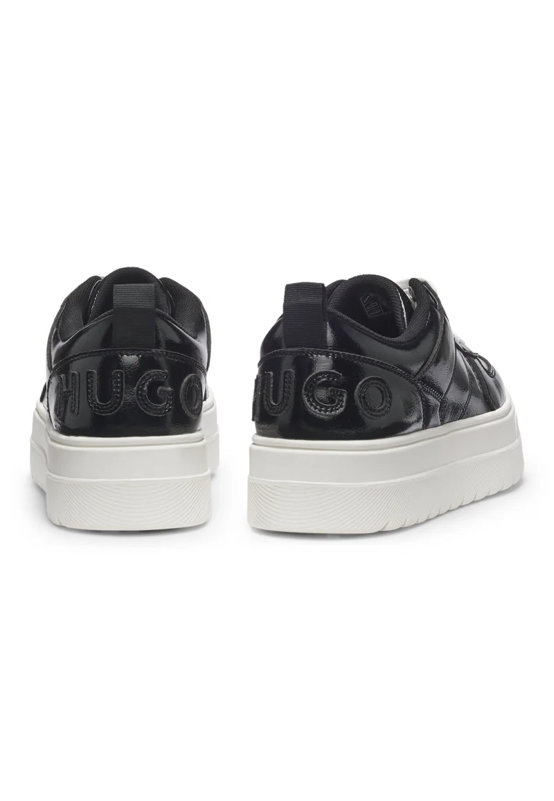 هوجو Platform trainers in patent faux leather