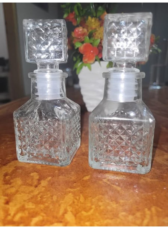 زجاجة عطر صغيرة بتصميم فاخر – 50 مل – زجاج شفاف بنقشة بارزة وغطاء مكعب-4945 - Image 4