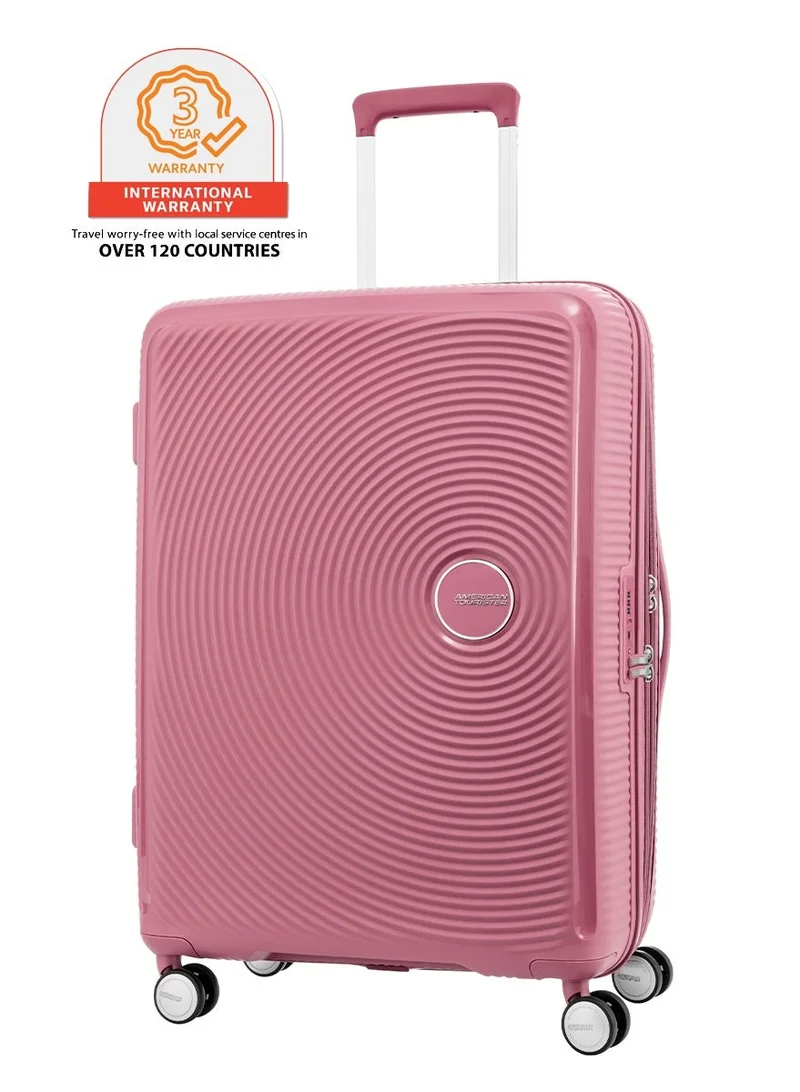 امريكان توريستر حقيبة سفر كوريو، حجم الأمتعة المسجلة  سم،  عجلات دوارة، سطح صلب، بولي بروبلين، لون زهرة الخوخ، سحاب أمان ، مساحة داخلية واسعة، قابلة للتوسيع، قفل  ، خفيفة الوزن - ضمان عالمي  سنوات