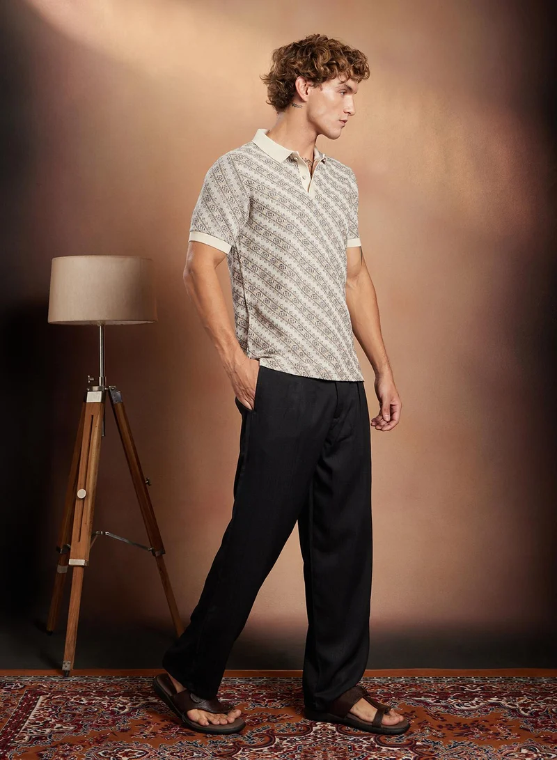 Campus Sutra Campus Sutra Men's Off-White Flora-Slant Polo T-Shirt For Casual Wear | Polo Neck | Short Cuffed Sleeves | Half-Button Closure | T-Shirt Crafted With Comfort Fit For Everyday Wear